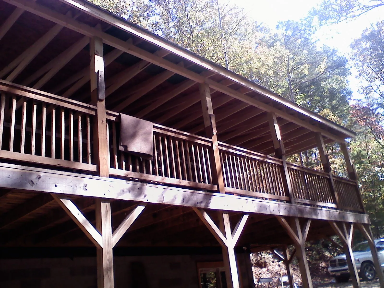 Timber framing under a new elevated porch and deck — Roof Leak Repair in North Baltimore by Roofing Brothers